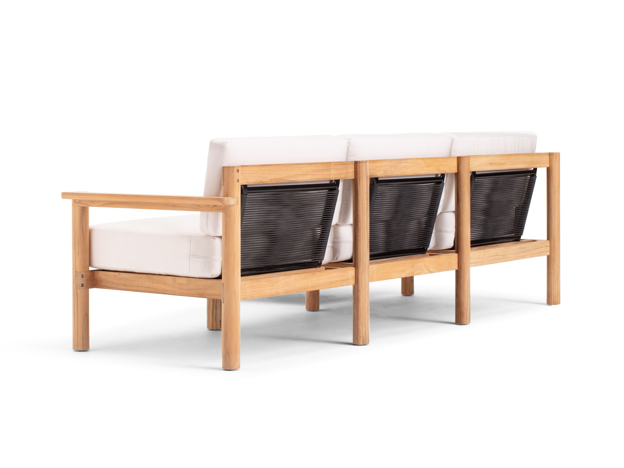 Back angle view of 4-piece outdoor sectional with white cushions